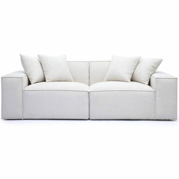 Sofa tapicerowana o dekoracyjnym profilu z eleganckim profilem w odcieniu bieli