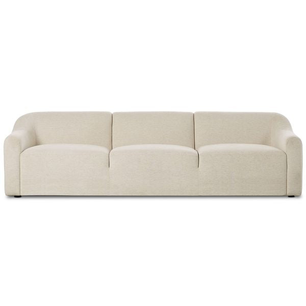 Sofa tapicerowana o subtelnym charakterze z oszczednym detalem w odcieniu bieli